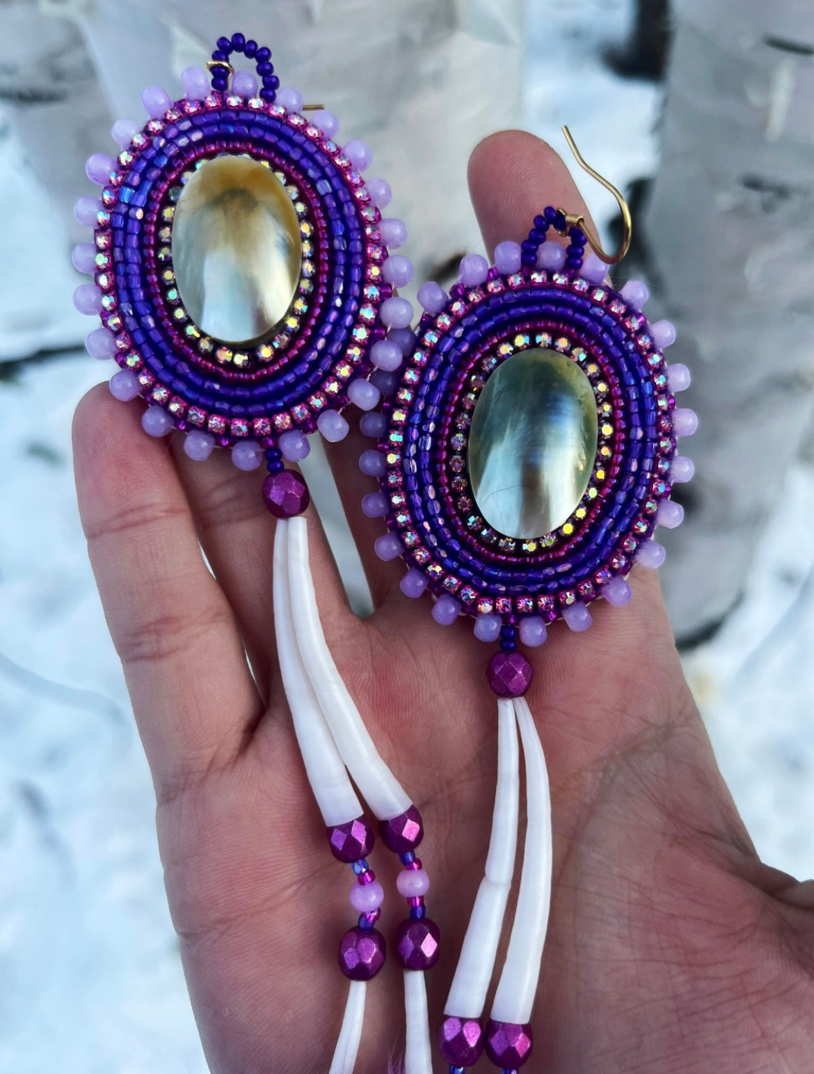 SHELL, DENTALIUM & PURPLE RABBIT FUR STATEMENTS