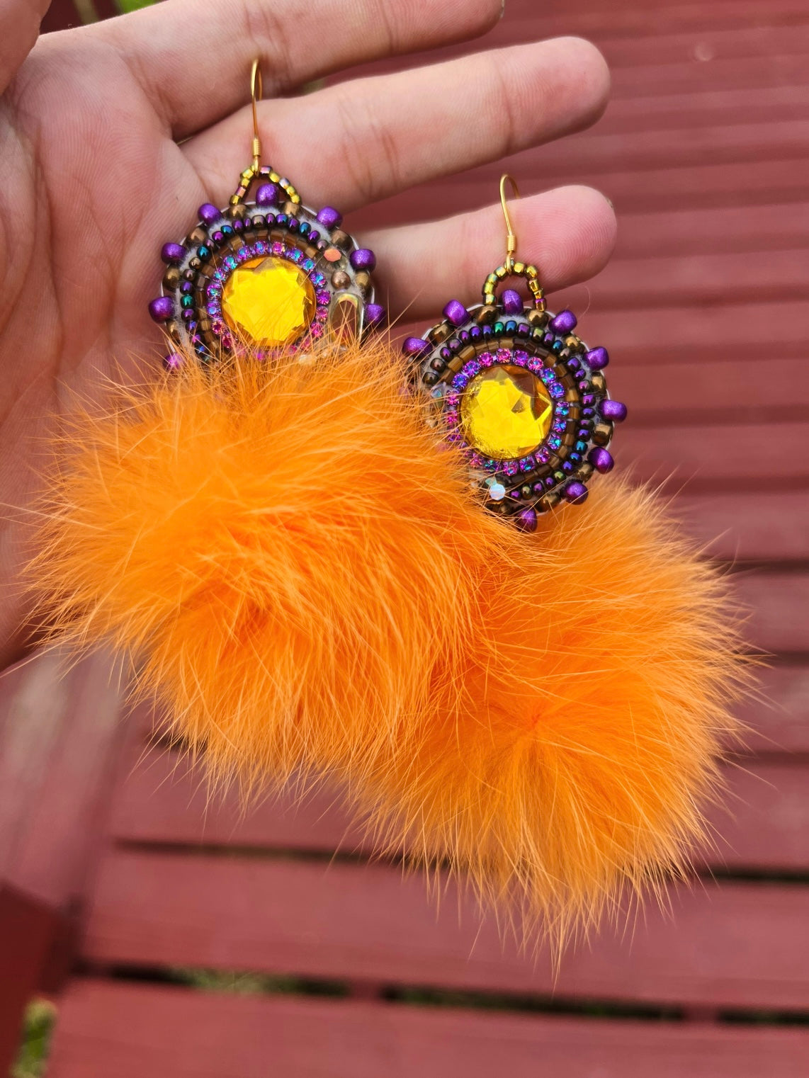 LIGHT ORANGE RABBIT FUR PUFFS WITH PURPLE SALMON SKIN BACKING