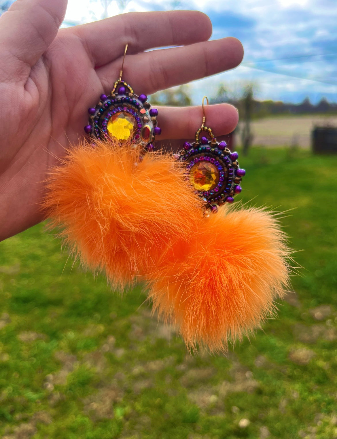 LIGHT ORANGE RABBIT FUR PUFFS WITH PURPLE SALMON SKIN BACKING